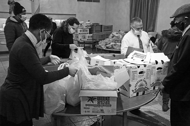 2020 : Food Lines : Seventh Day Adventists Help the Needy : Streetlife : New York City : Times Square : Richard Moore : Photographer : Photojournalist